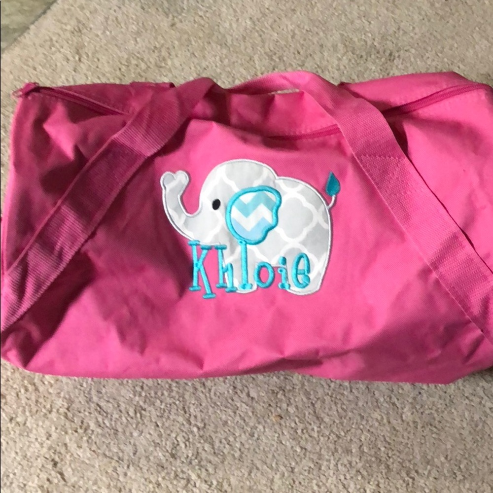 Pink canvas duffle bag